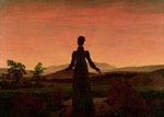 woman before the rising sun